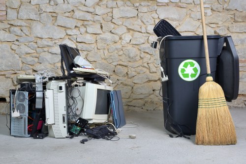 Workers sorting recyclable materials at a commercial site